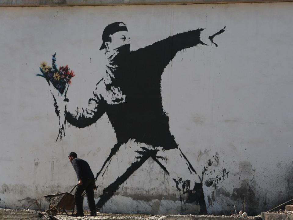 banksy flower thrower